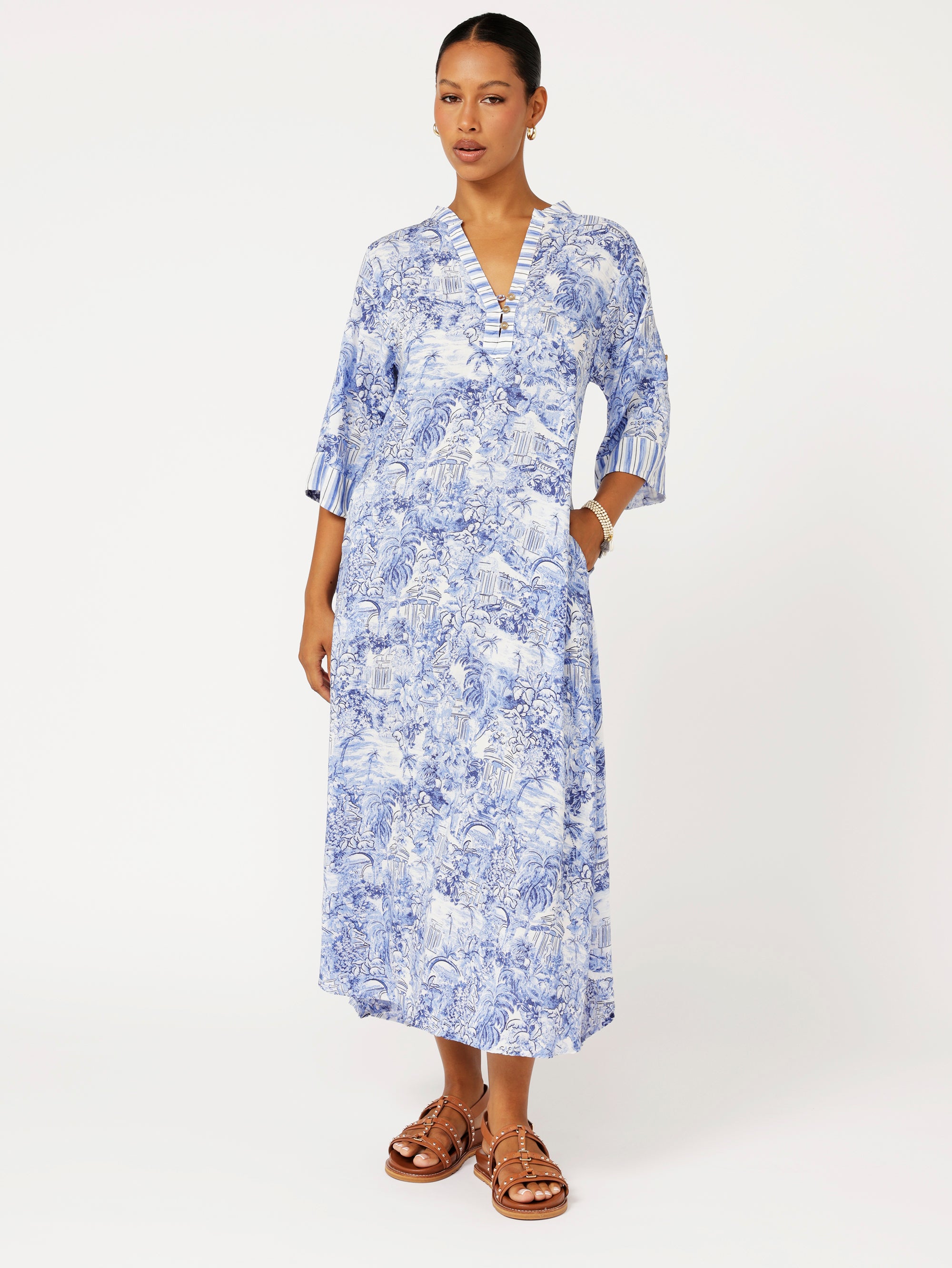 front view of model wearing the Jet Set Gypsy Dress in blue Toile de Jouy rayon print