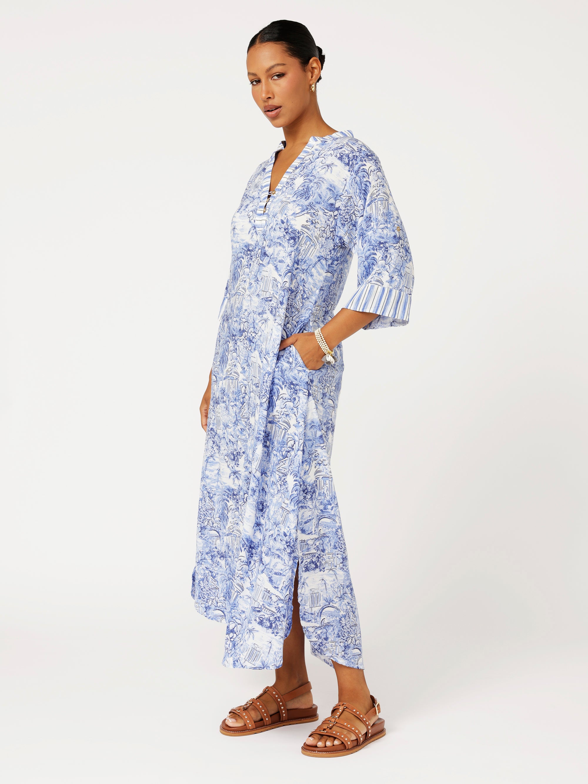 Side view of model wearing the Jet Set Gypsy Dress in blue Toile de Jouy rayon print