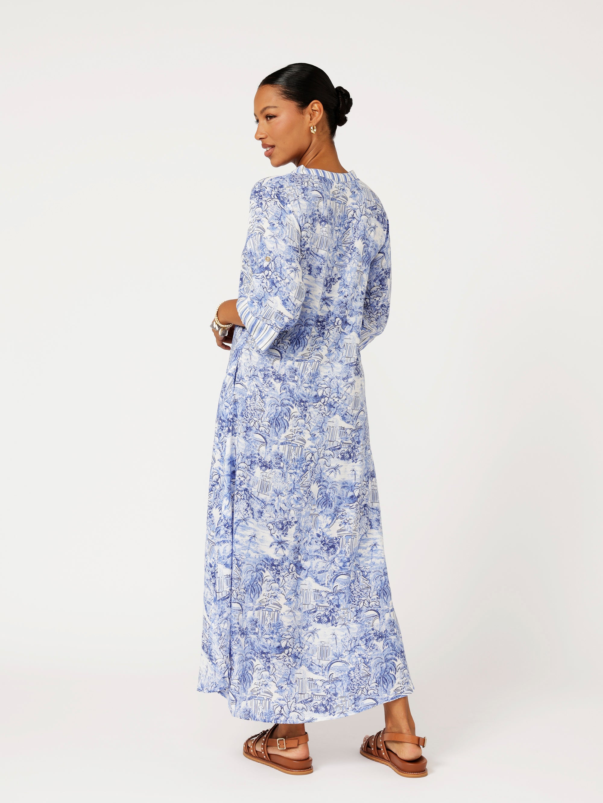 back view of model wearing the Jet Set Gypsy Dress in blue Toile de Jouy rayon print