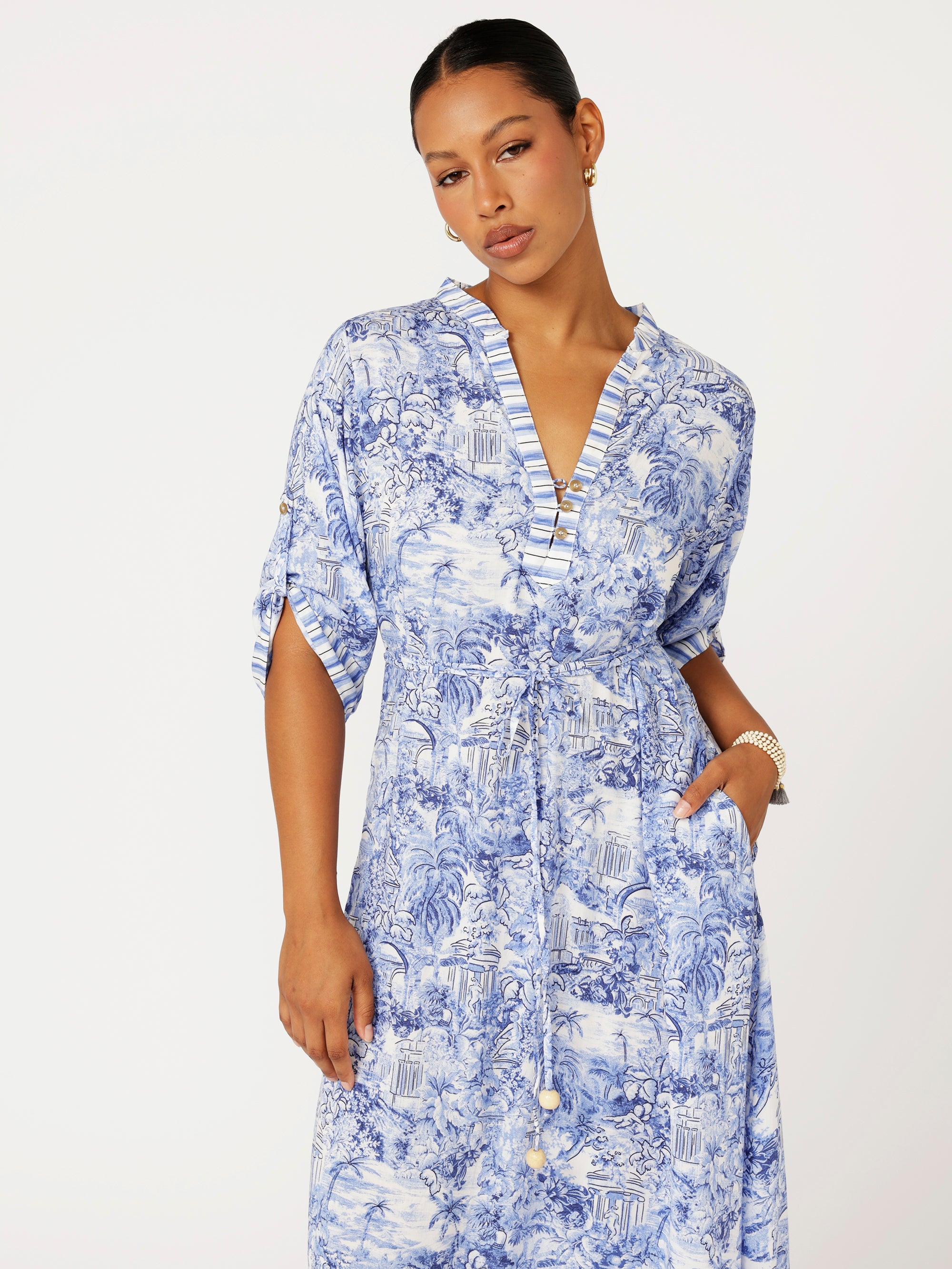 front view of model wearing the Jet Set Gypsy Dress in blue Toile de Jouy rayon print