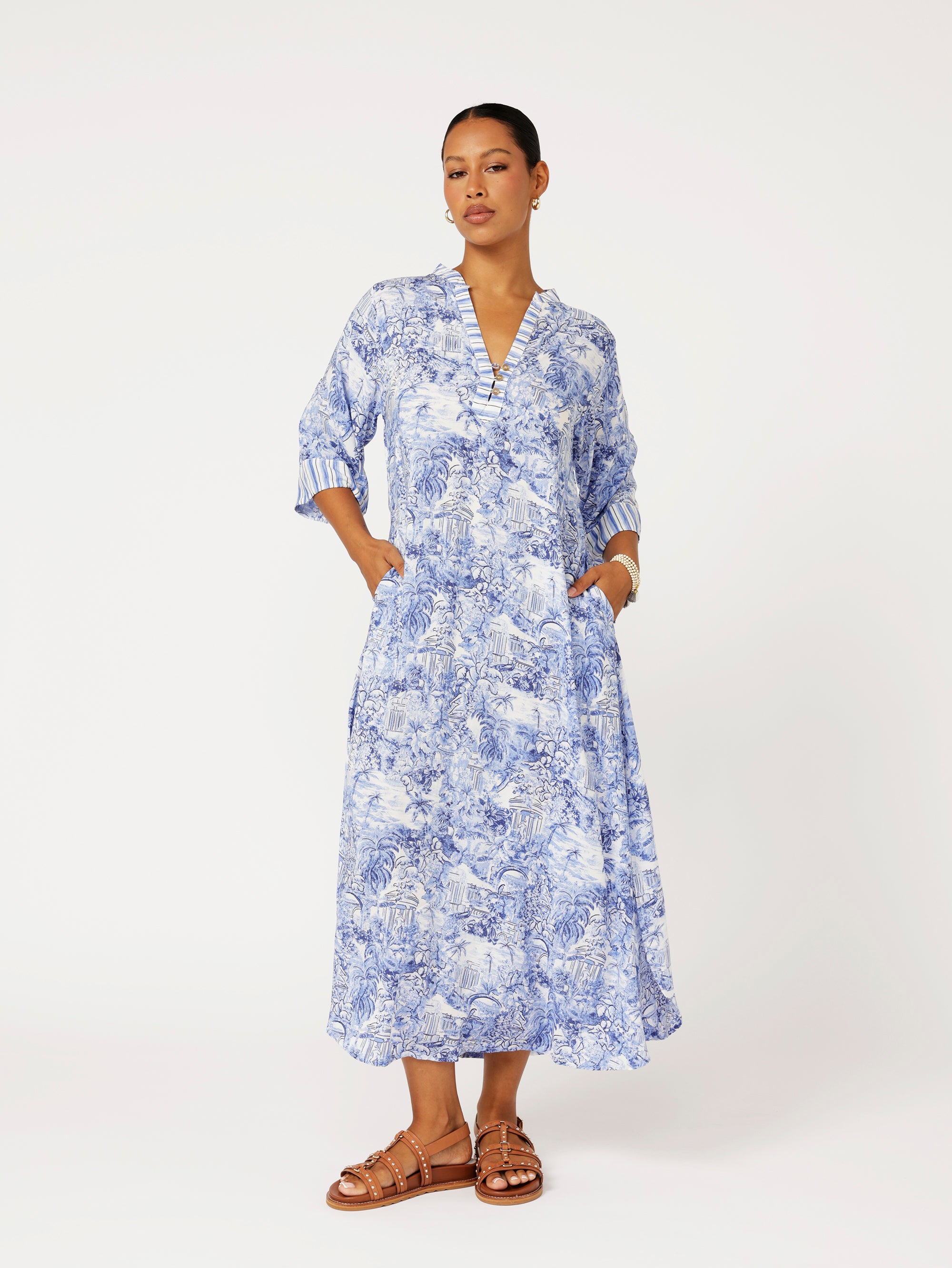 front view of model wearing the Jet Set Gypsy Dress in blue Toile de Jouy rayon print