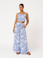 Front view of model wearing the Lost City Palazzo Pants in blue Toile de Jouy rayon print with contrast side stripe