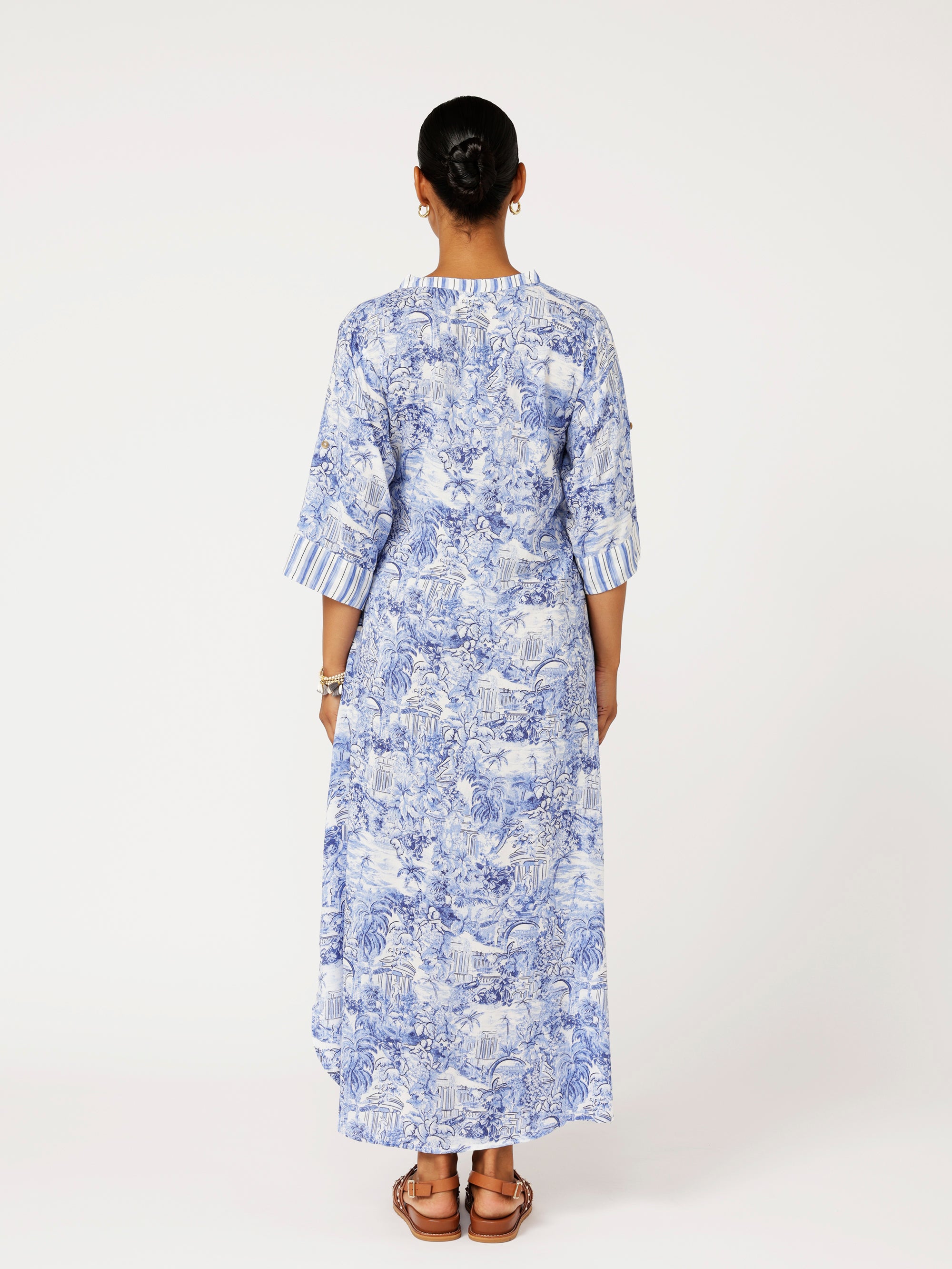 back view of model wearing the Jet Set Gypsy Dress in blue Toile de Jouy rayon print
